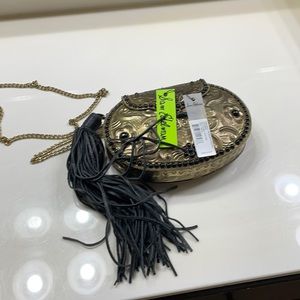 Metallic purse by Sam Edelman